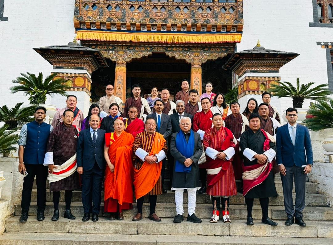 India's Power Minister Manohar Lal Khattar with Bhutanese counterpart and other officials during his visit to Punatsangchhu Hydropower project in Bhutan.