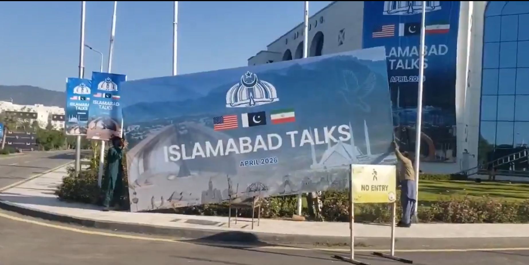 A poster linked to the US–Iran peace talks in Pakistan's Islamabad is being taken down, after negotiations ended, without any outcome
