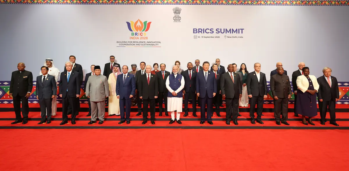 Indian Prime Minister Narendra Modi (at the centre) in a family photo with leaders of BRICS member/partner countries outreach invitees and heads of international organisations at the 18th BRICS Summit in New Delhi on September 13, 2026.