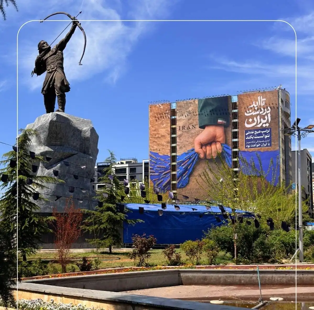 Billboard on the Vanak Square: "Forever in Iran’s Hand", referring to the Strait of Hormuz. In the foreground is the statue of Arash the Archer, mythical Iranian hero that defined Iran's border.